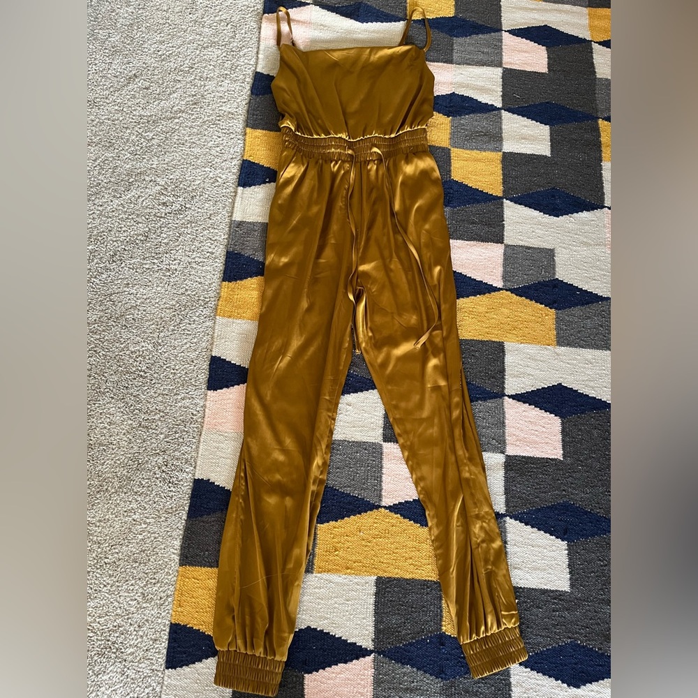 Beautiful olive-ochre jumpsuit with POCKETS! Perfect for dressing up or down!